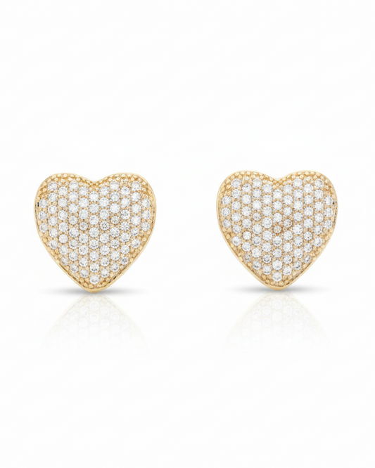 Heart-shaped earrings with diamond accents on a white background